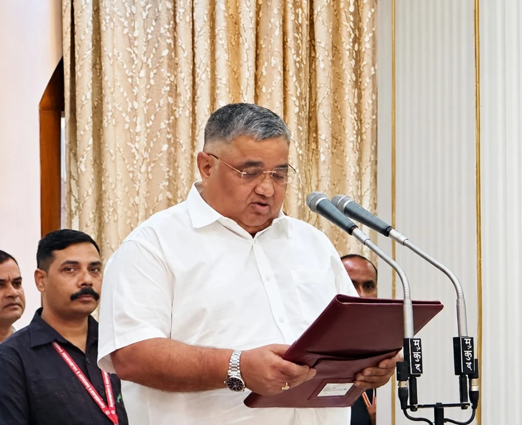 Rajesh Agrawal speaking at a lectern